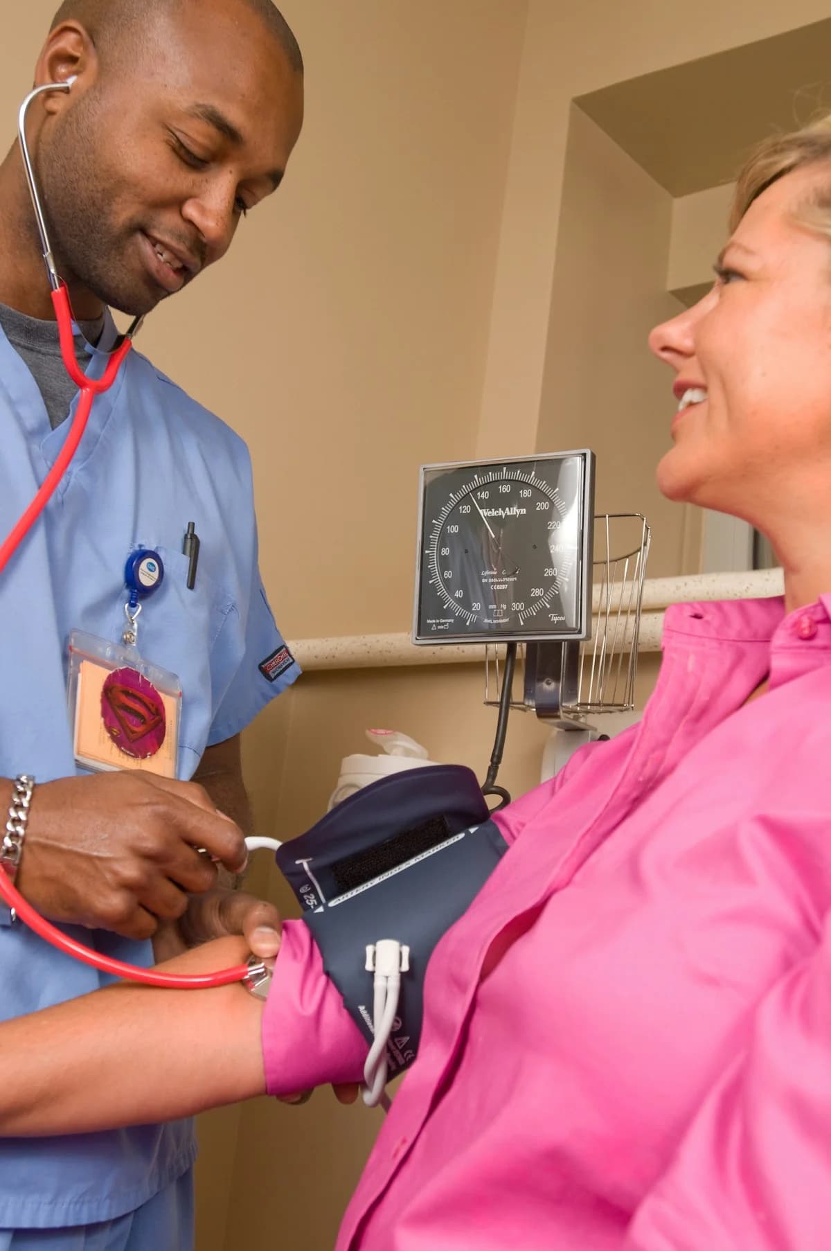 Primary Care Doctor Reviewing Patient Records